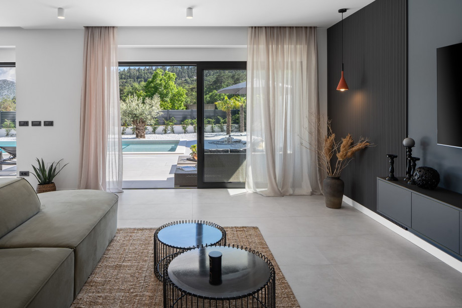 stylish living room with a sofa and TV