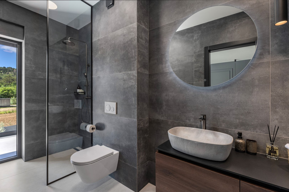 ensuite bathroom with a shower