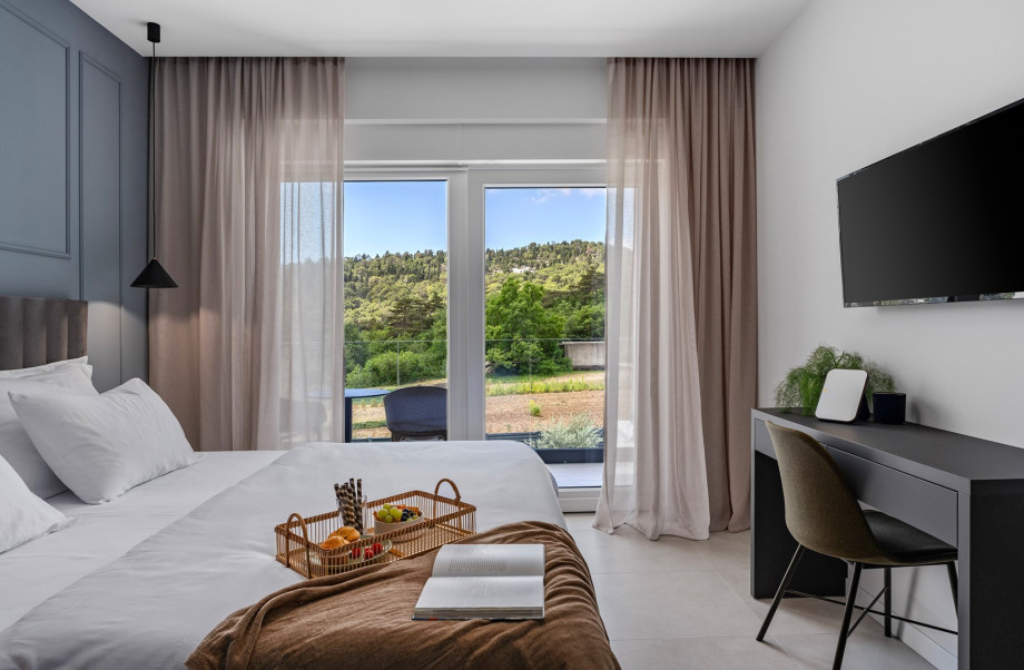 Bedroom NO3 with a king-size bed, A/C, TV, balcony overlooking the pool and surrounding landscape, and en suite bathroom with a shower.