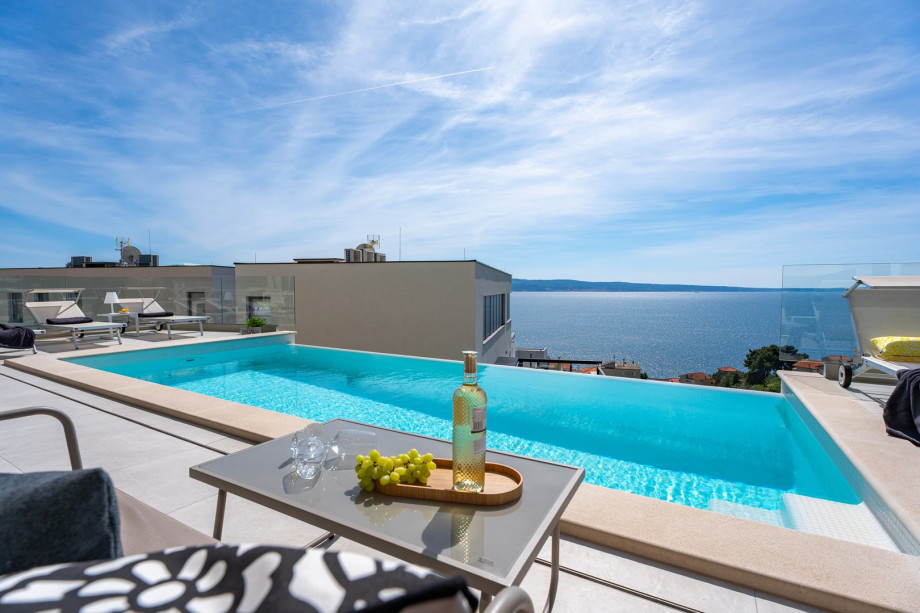 Three-bedroom villa, perched above the picturesque coastline