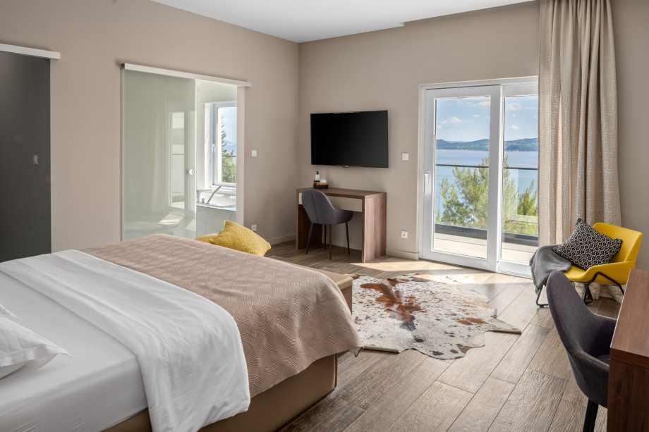 A Master Bedroom No1 offers a king-size bed 180cm x 200cm and amazing sea views