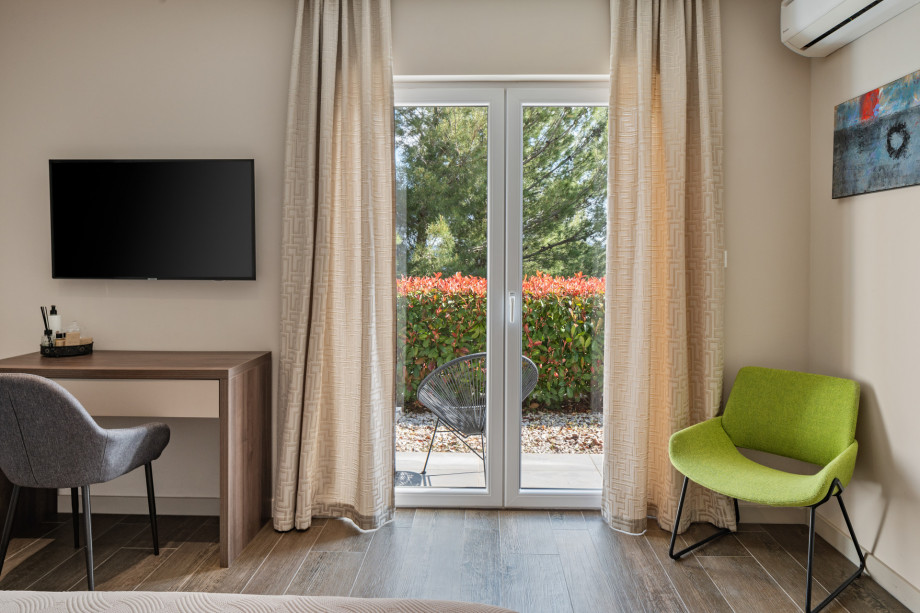 Bedroom No2 with king size bed, en-suite, TV, A/C sea views, exit to the garden