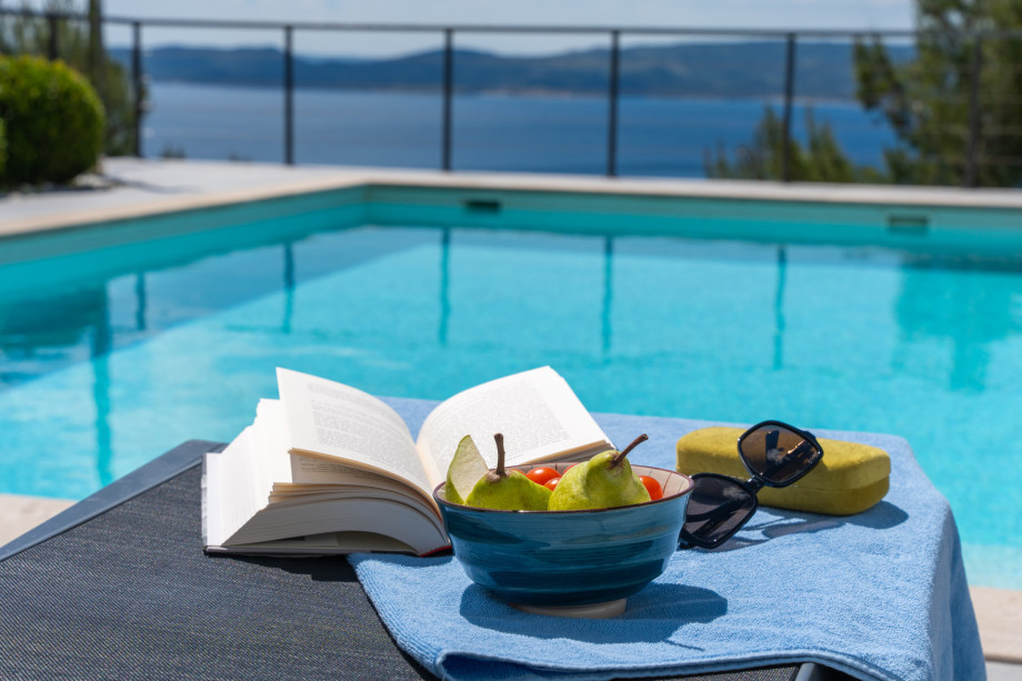 ...or just sunbathing with your favorite book and seasonal fruits