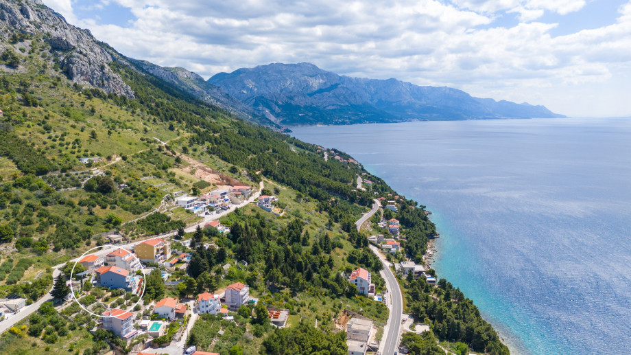 The whole property is fully fenced, and there are 3 parking places on the private plot