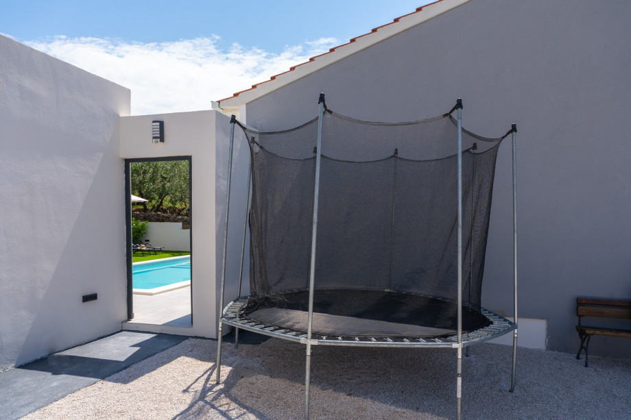 trampolin next to the parking lot