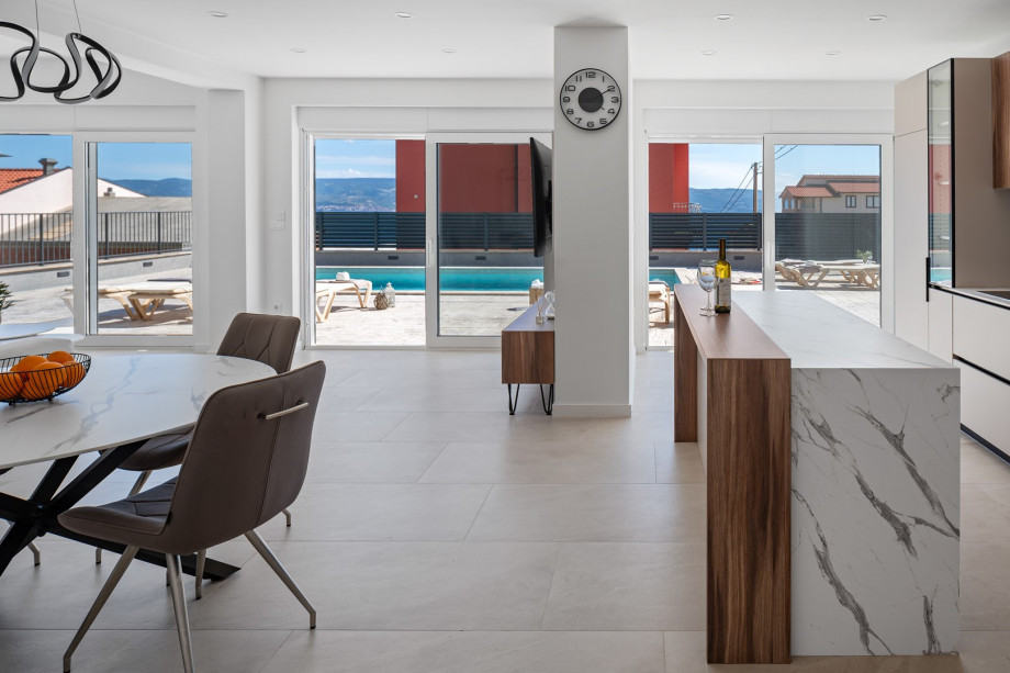 Large, elegantly designed living area with modern furnishings