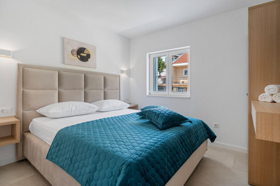 Bedroom NO3 (15sqm) with a super king size bed 200cm x 200cm, TV,A/C, a balcony with sea views, en-suite