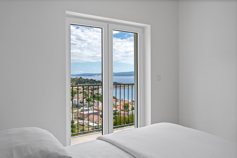 Bedroom NO6 with a super king size bed, en-suite