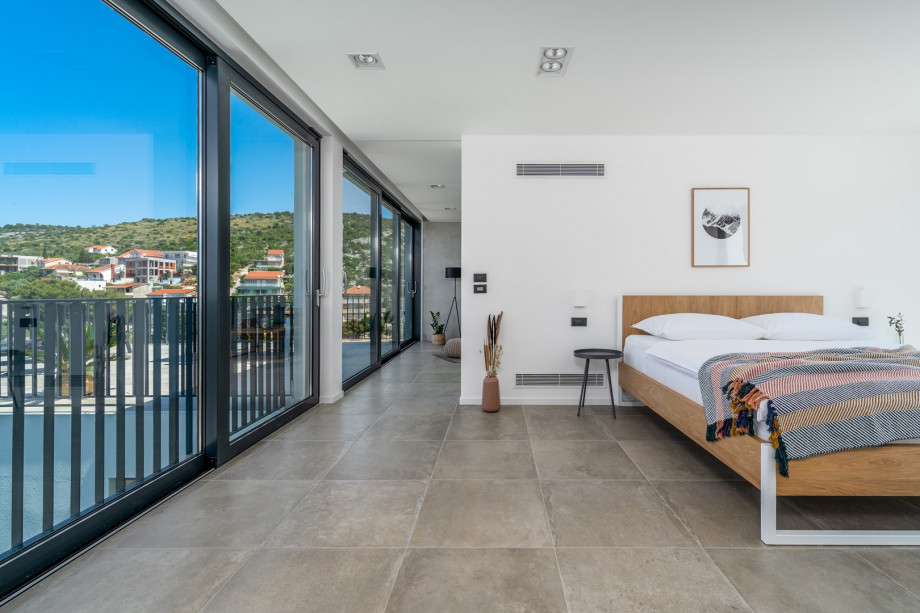 master Bedroom No3 with sea views, a king size bed and a daybed