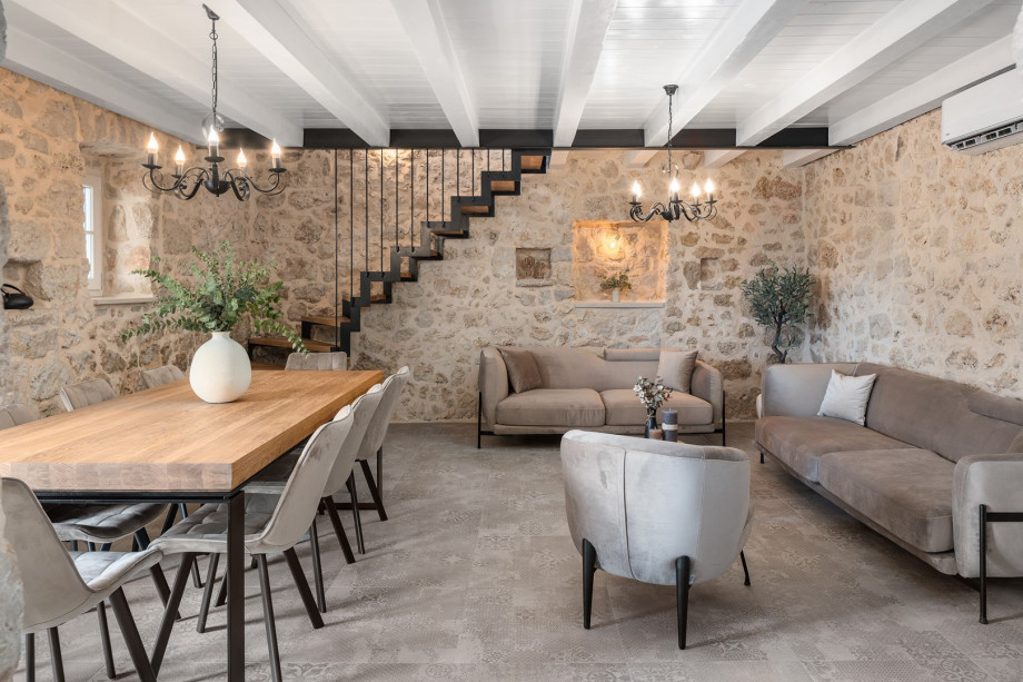 The main house welcomes you with a cozy kitchen