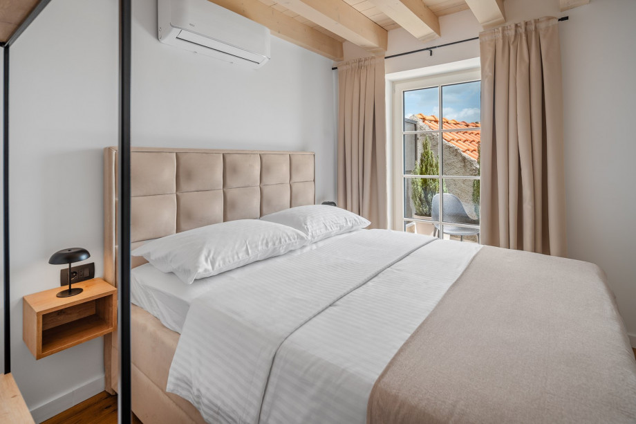 Access to a charming terrace with pool views