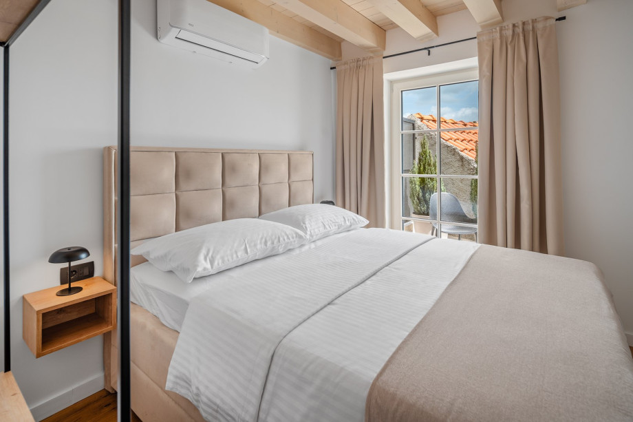 Access to a charming terrace with pool views