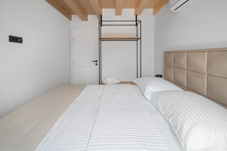 Bedroom No2 offers a luxurious king-size bed