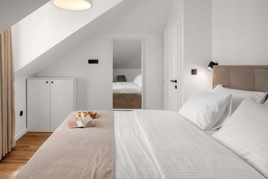 Venture up to the attic to discover Bedroom No3 offering king-size bed