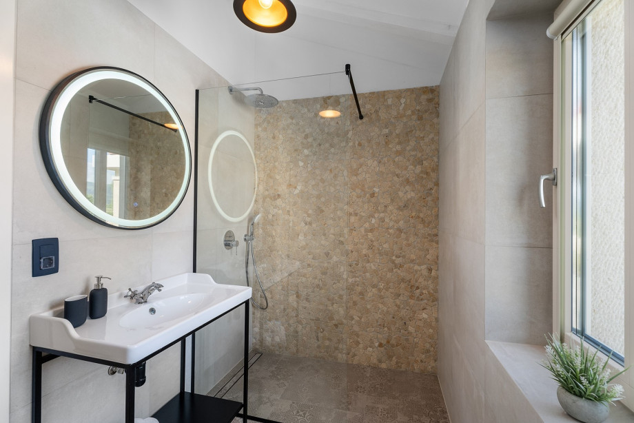 A family bathroom with a shower.