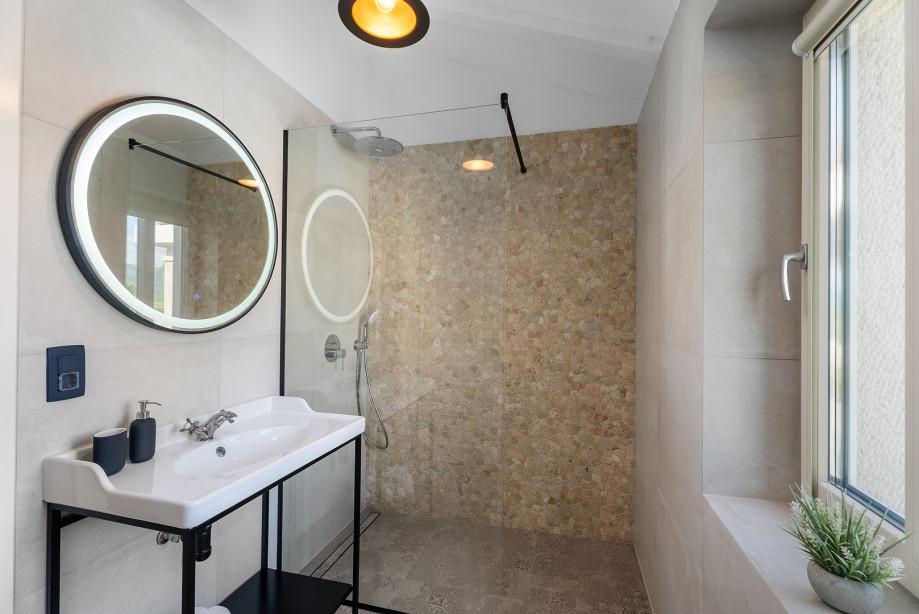 A family bathroom with a shower.