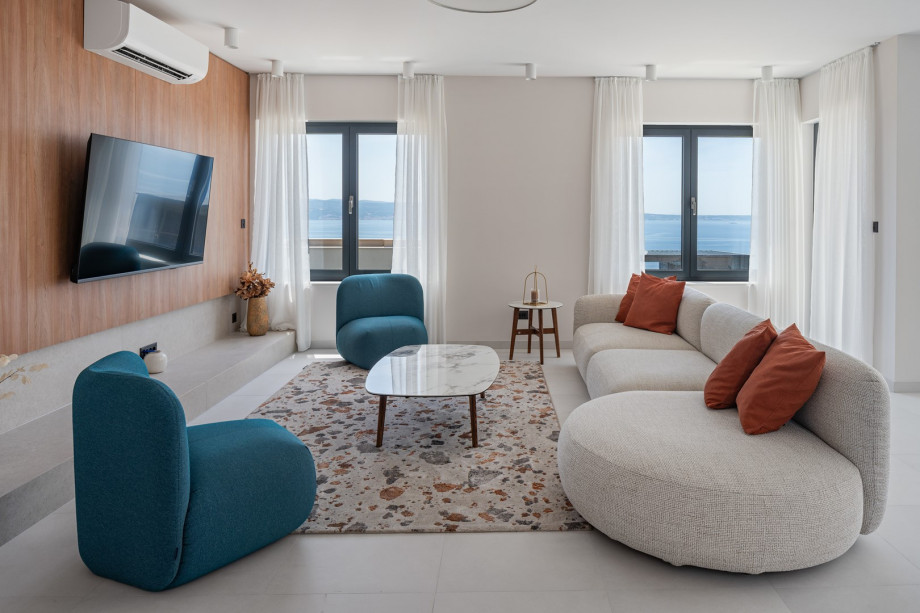 The living area (ground floor level) offers a stylish living area