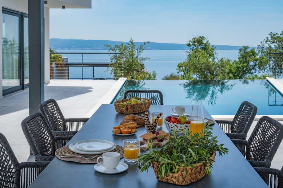 A cozy 300 square meter interior tucked away on a private 600 square meter fenced plot.