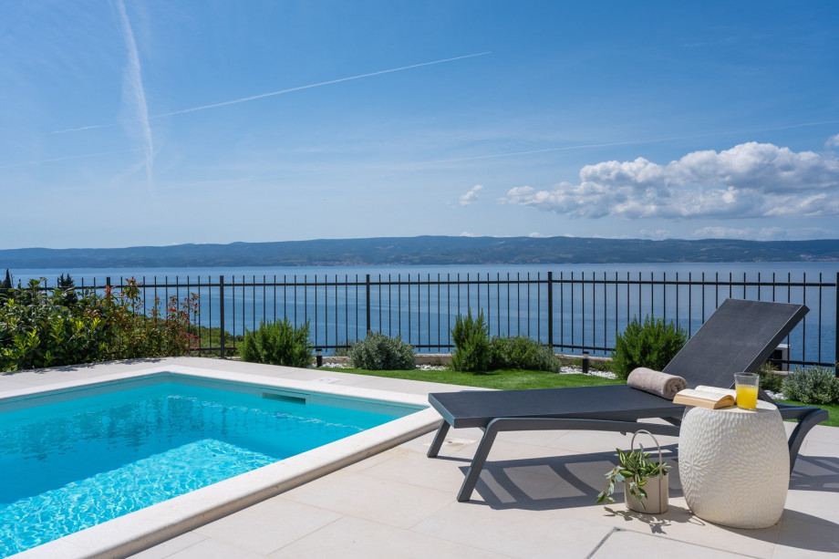 Spacious sun deck area with sea views