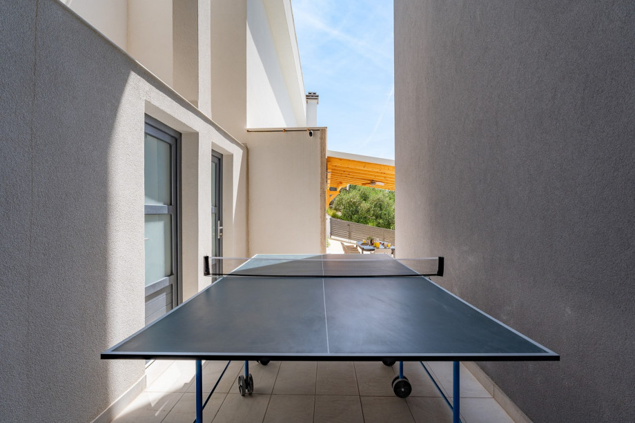 Outdoors (pool level) with table tennis