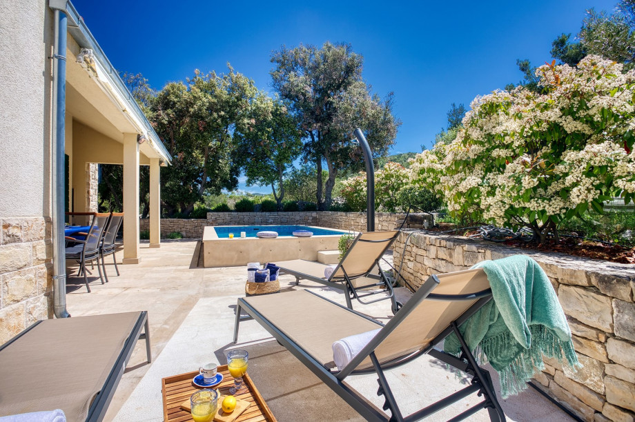 The outdoor area offers 6 deck chairs at the sun deck area