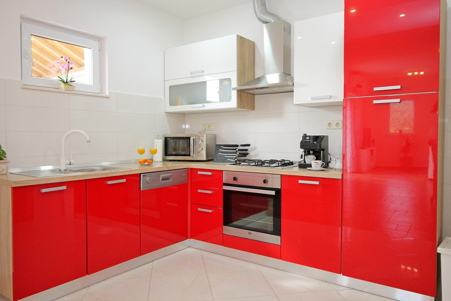 Fully equipped kitchen with dinning and living area and access to the pool