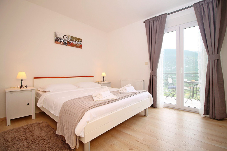 Bedroom No1 with double bed and exit to the terrace