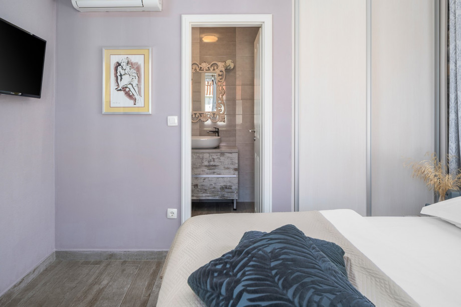 Bedroom NO1 with a double bed, A/C, TV