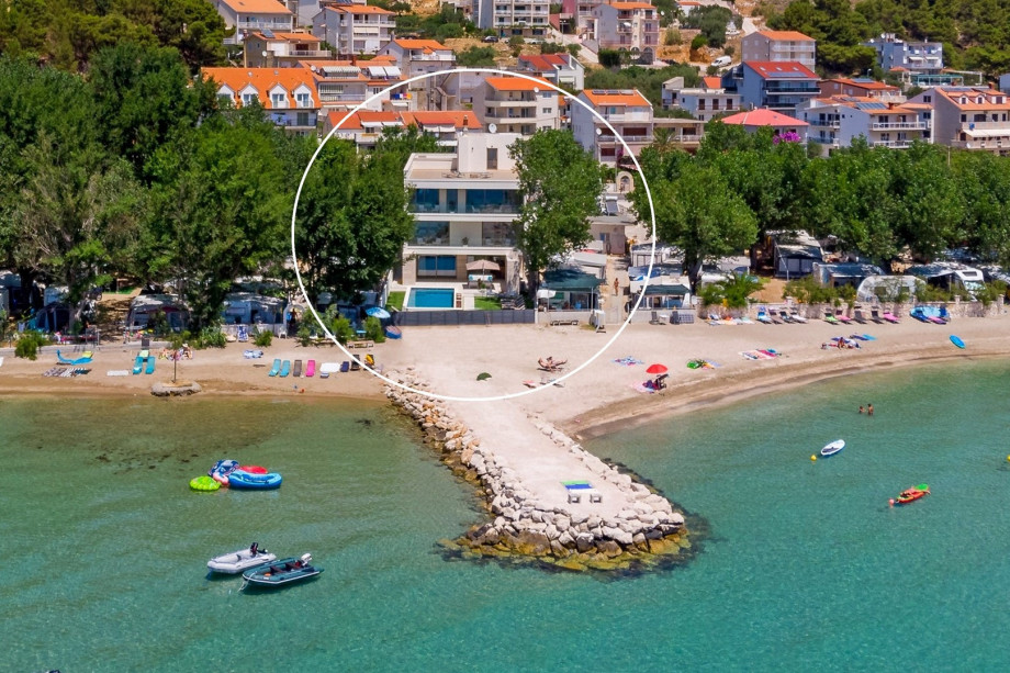 Villa Erce is located on the beachfront in Duce, between the famous town Split and small-town Omiš