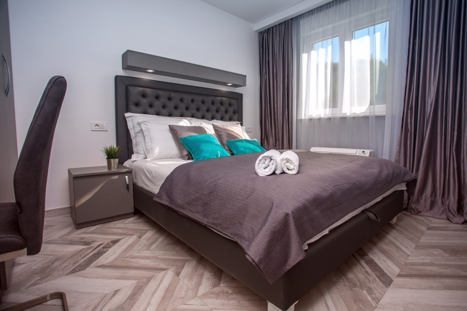 A Bedroom No.3 has a queen-size bed 160x200, an en-suite bathroom, TV, AC