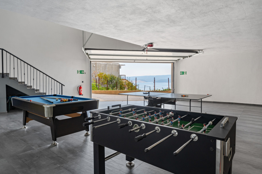 Play area with Pool Table, Table Tennis and Football table, located in the garage