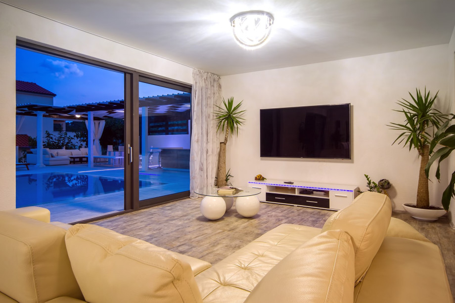 Living room with night view on outside area