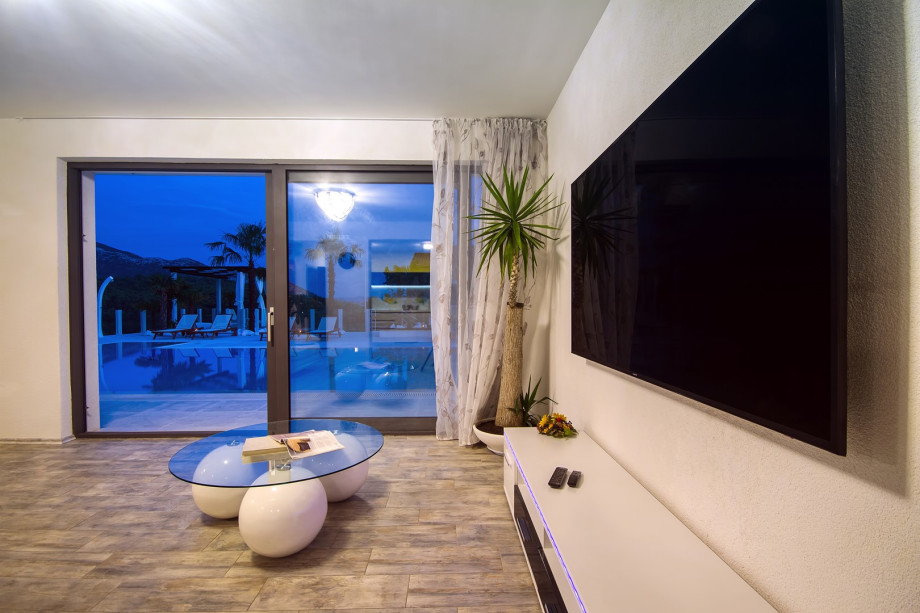 Living room with night view on outside area