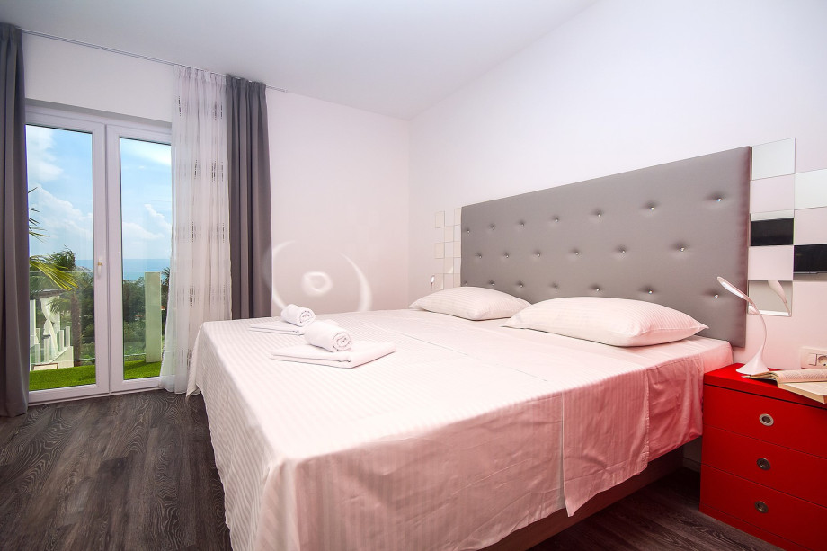 Bedroom No.3 with 200x200 bed, lcd tv, air conditioning and balcony