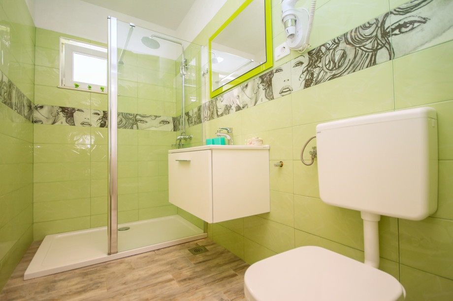 Family bathroom with a shower