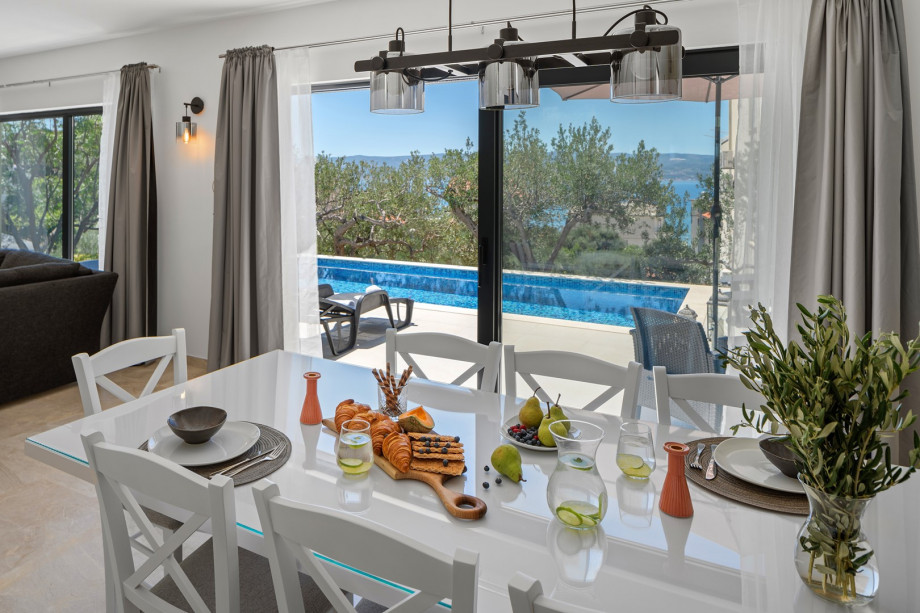 Spacious dining area for 8 pax filled with natural light