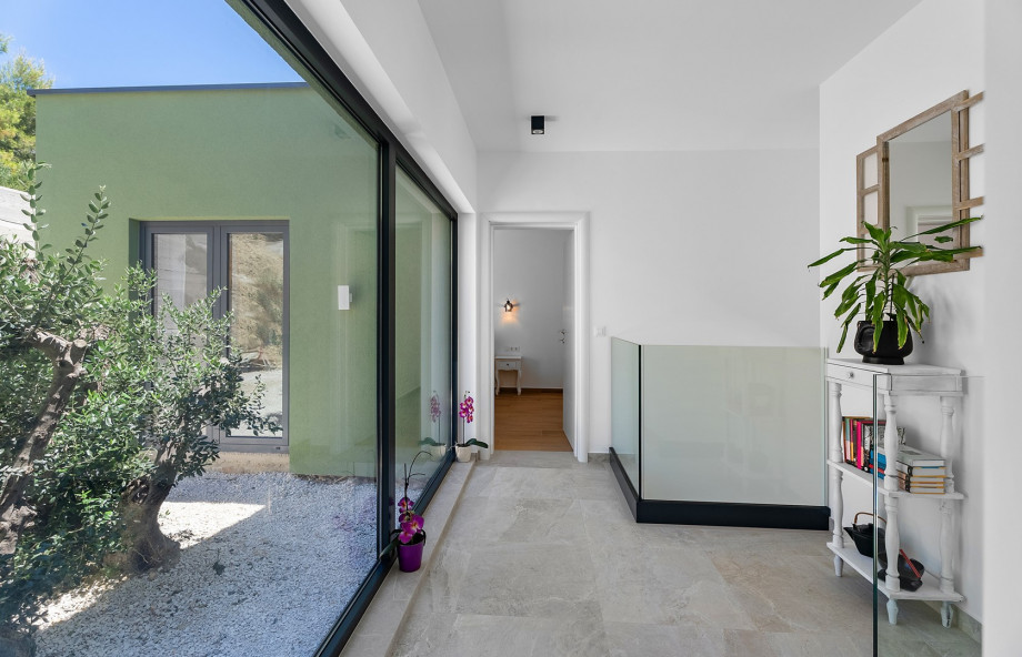 Hallway that connects all of the rooms with the living area