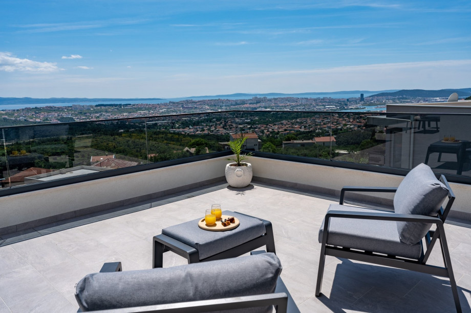 a spacious terrace with a lounge corner and with town Split and sea views (terrace is shared with Bedroom NO2, NO3 and NO4)