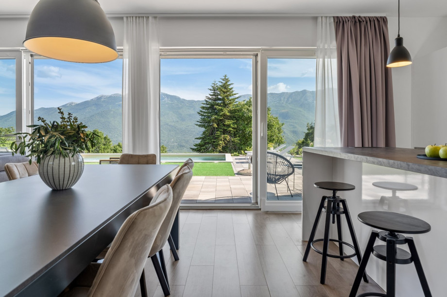 The ground floor consists of a very comfortable, air-conditioned living room with a direct approach to the pool area