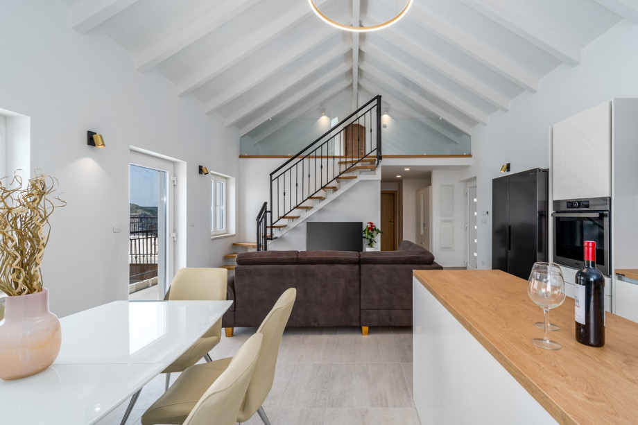 The GROUND floor includes a very light and pleasant living area with a comfortably furnished