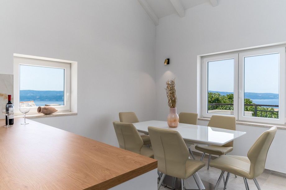 Living room with smart TV, there is a balcony connected to additional terrace with lounge corner (South orientation)