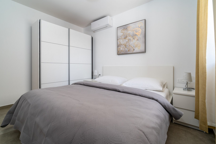 Bedroom No4 (12sqm) with a king size bed 180cm x 200cm, air-condition and sew views