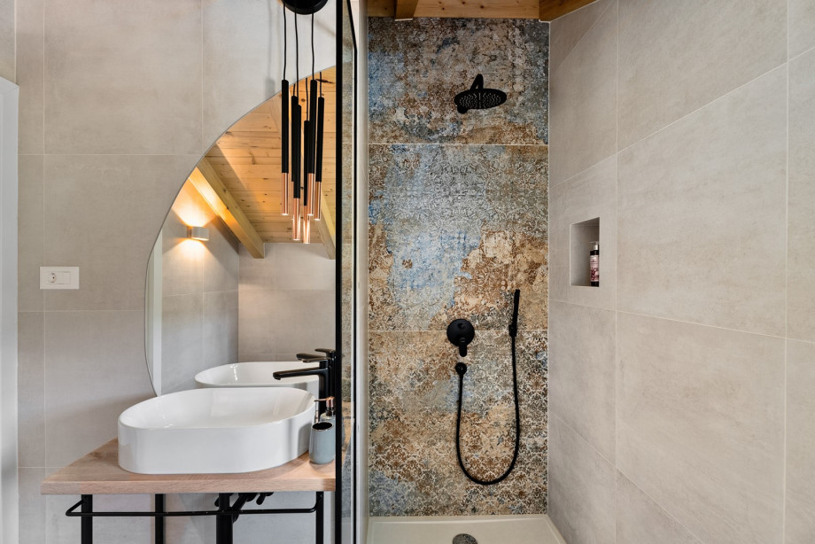 Completing the villa's amenities is a well-appointed family bathroom