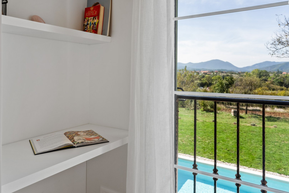 Bedroom No.2 also offer air conditioning, and a overlooking the serene pool