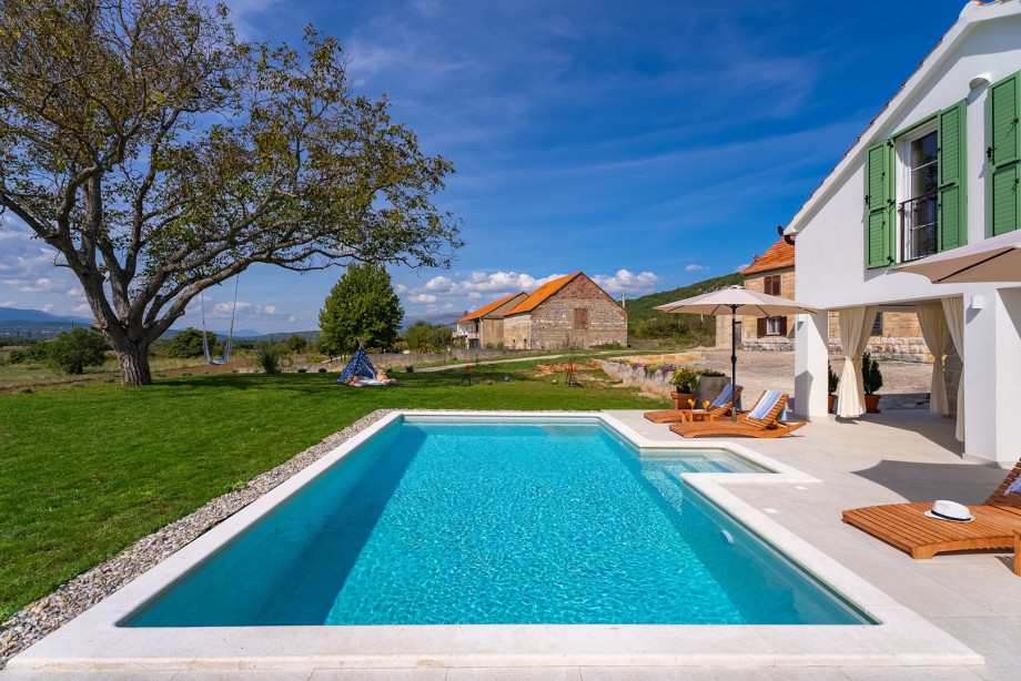 Surrounded by a spacious sun deck, guests will find six inviting deck chairs