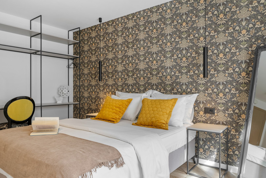 Bedroom NO3 has a queen size bed 160x200cm, TV, AC, en-suite bathroom, and a balcony