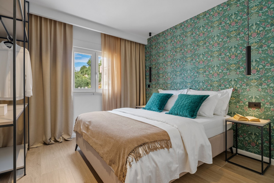 Bedroom NO4 is equipped with a queen-sized bed 160x200cm, TV, AC,  en-suite bathroom