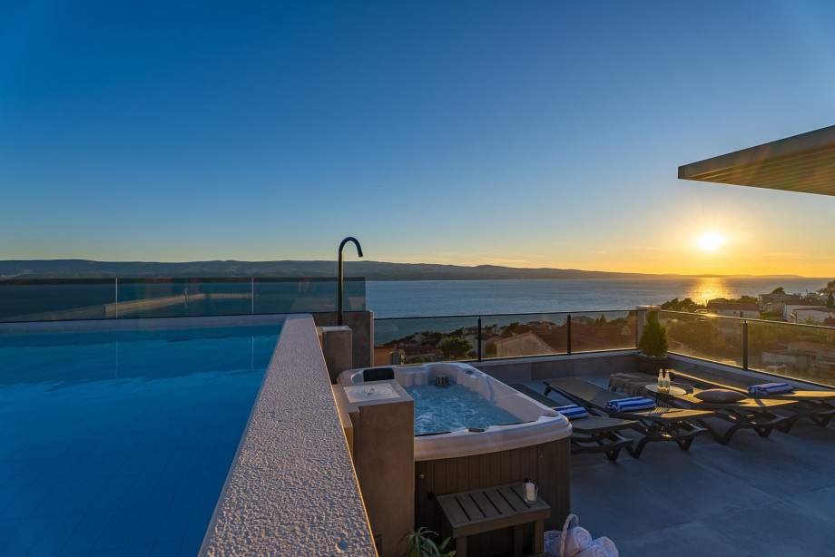 Enjoy a magic sunset view from the pool or whirlpool, choose your favorite spot