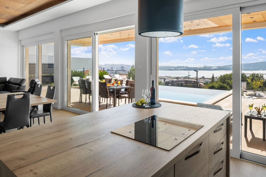 Direct exit, from the living/kitchen area to the sun deck area with sea views