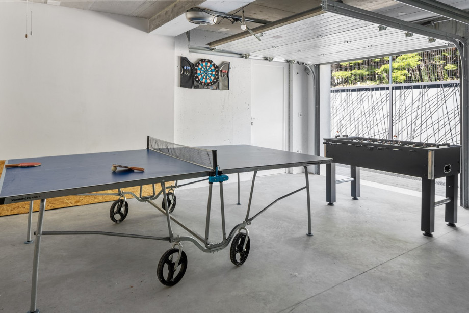 Garage with table tennis, football table, darts, etc.